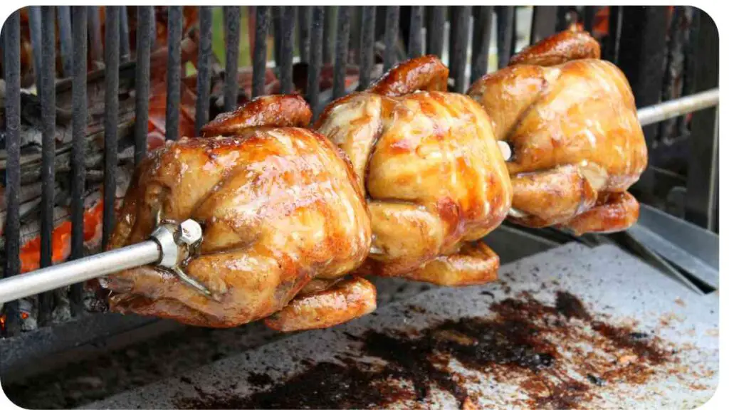 chicken roasting on a grill